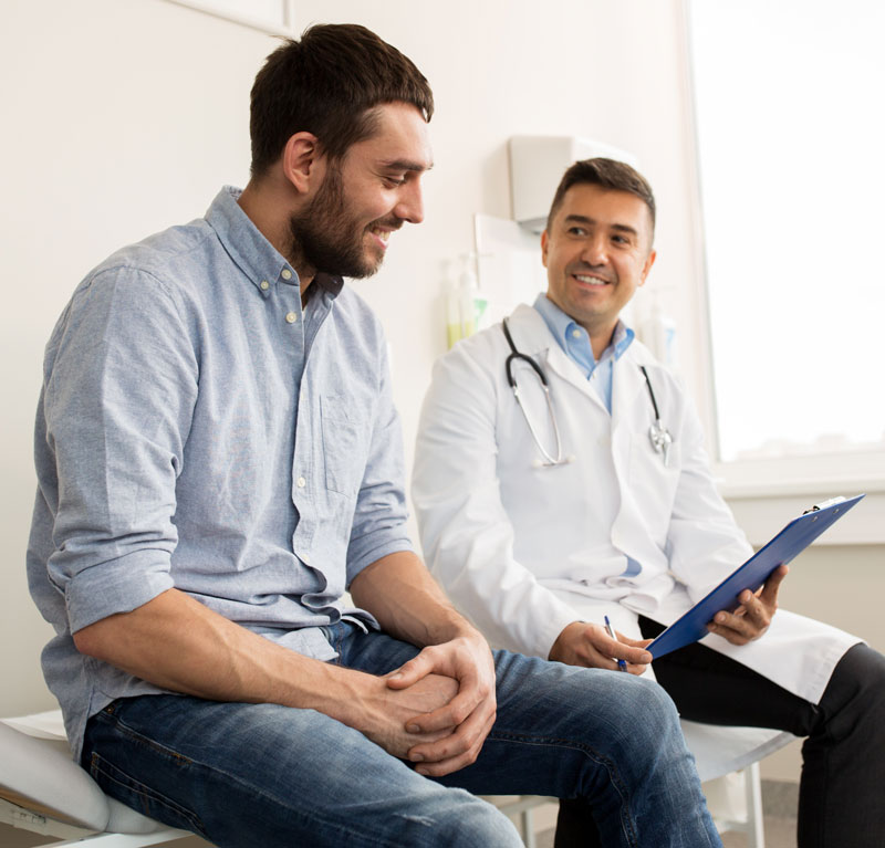 Patient and doctor reviewing lab test results