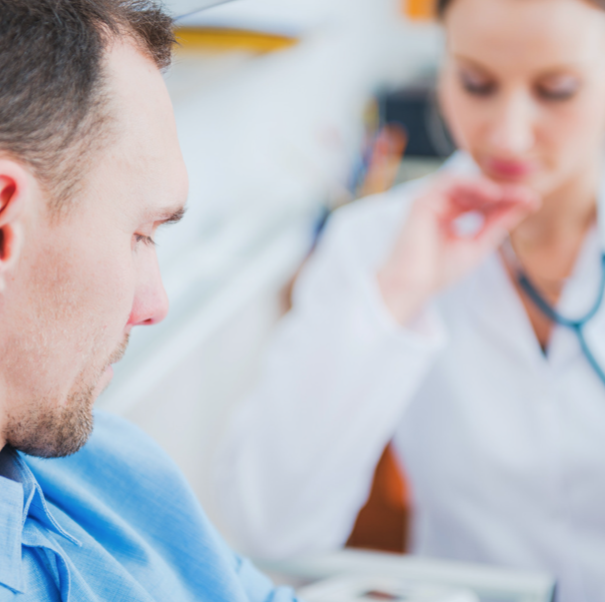 man talking with doctor