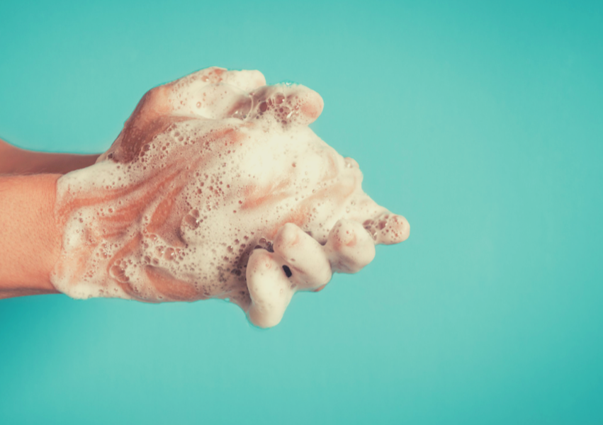 person washing hands