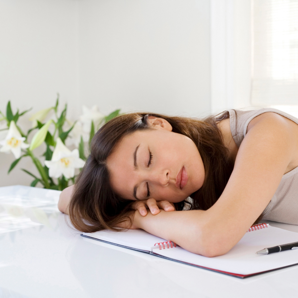 lady experiencing fatigue at work
