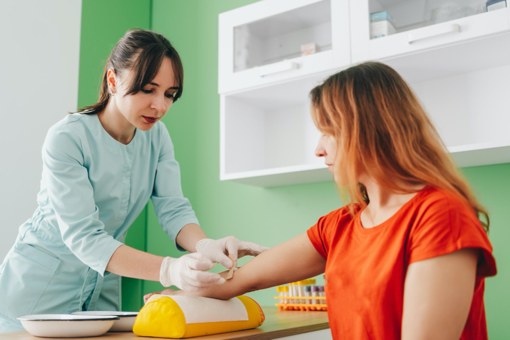 Photo blood collection from a patient passing tests
