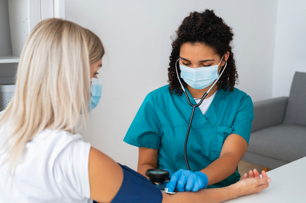 Professional phlebotomist performing a clinical blood draw for a Personalabs patient at a partner lab.